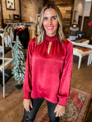 Meet Me Under The Mistletoe Blouse in Wine